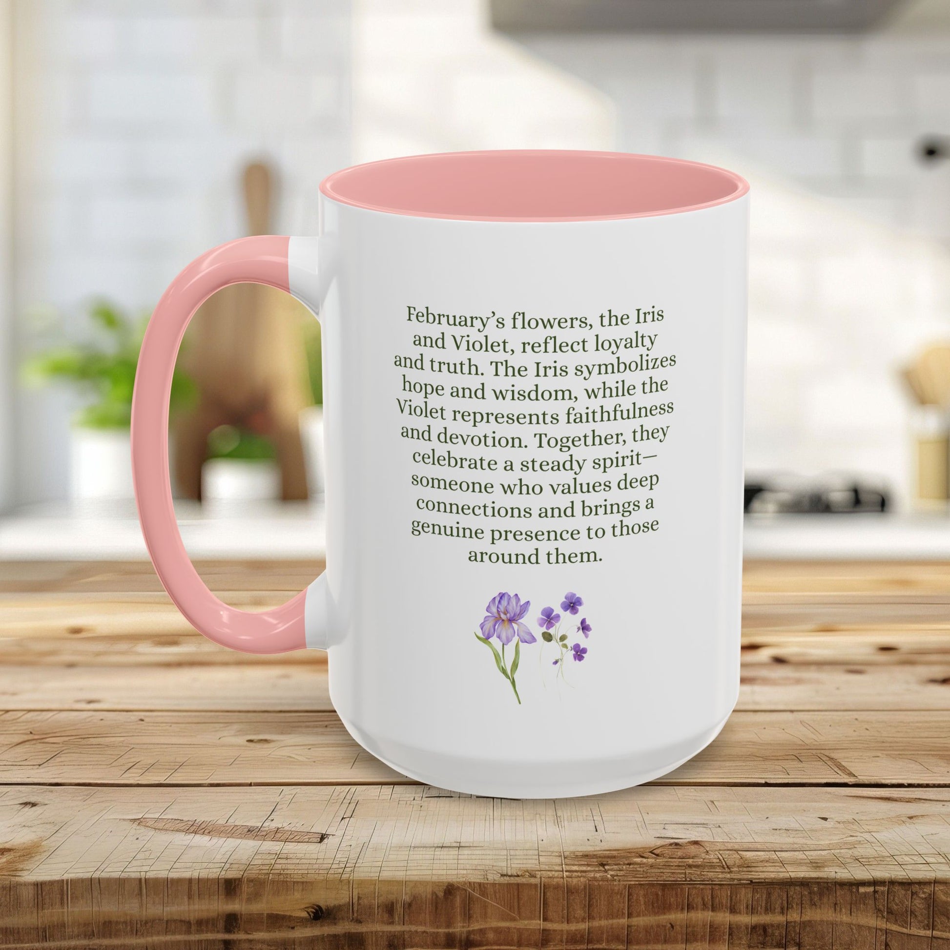 White ceramic mug with pink interior and handle, featuring February birth month flower iris and violet watercolor print.