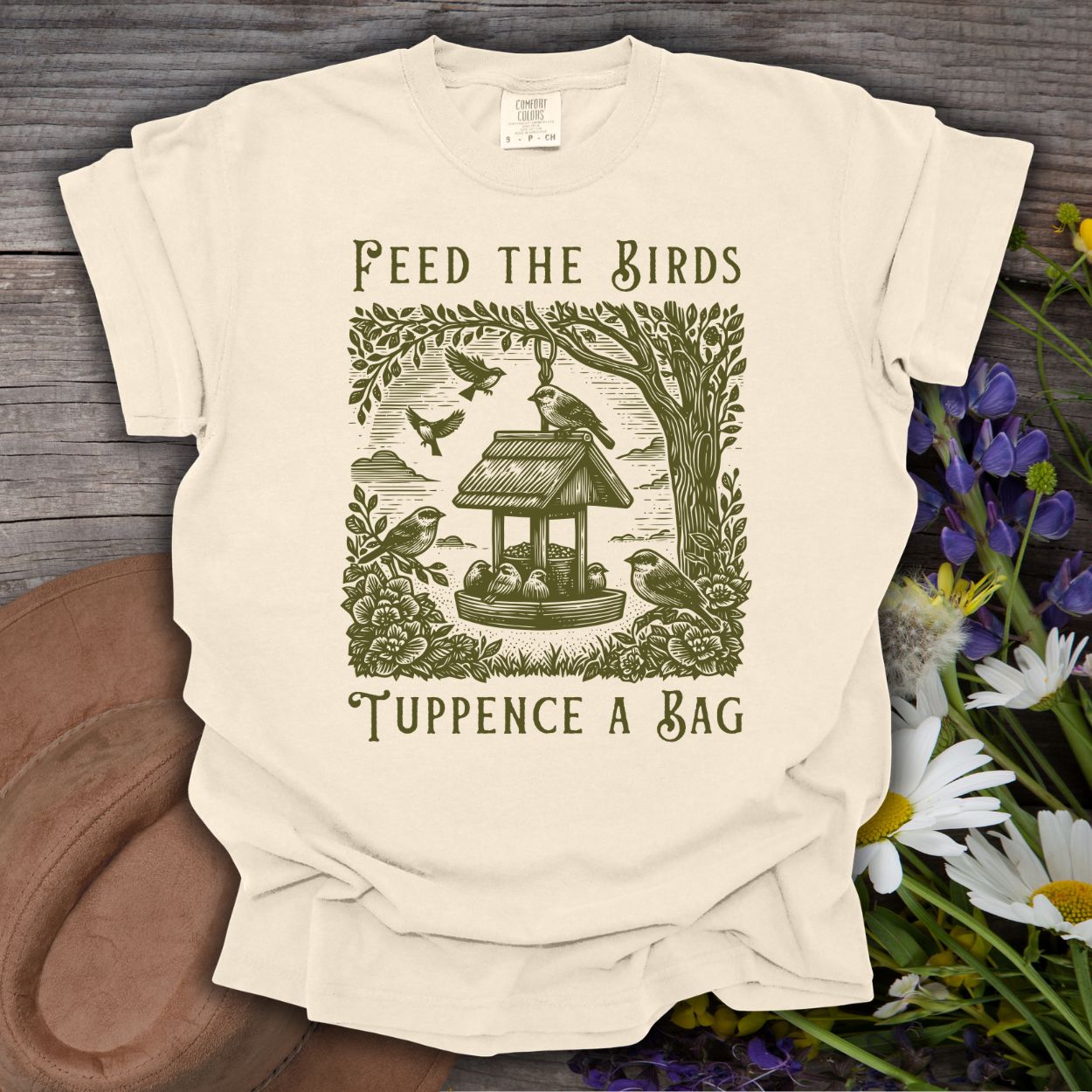 Ivory S unisex t-shirt with a vintage-style illustration of a bird feeder, finches, and sparrows.