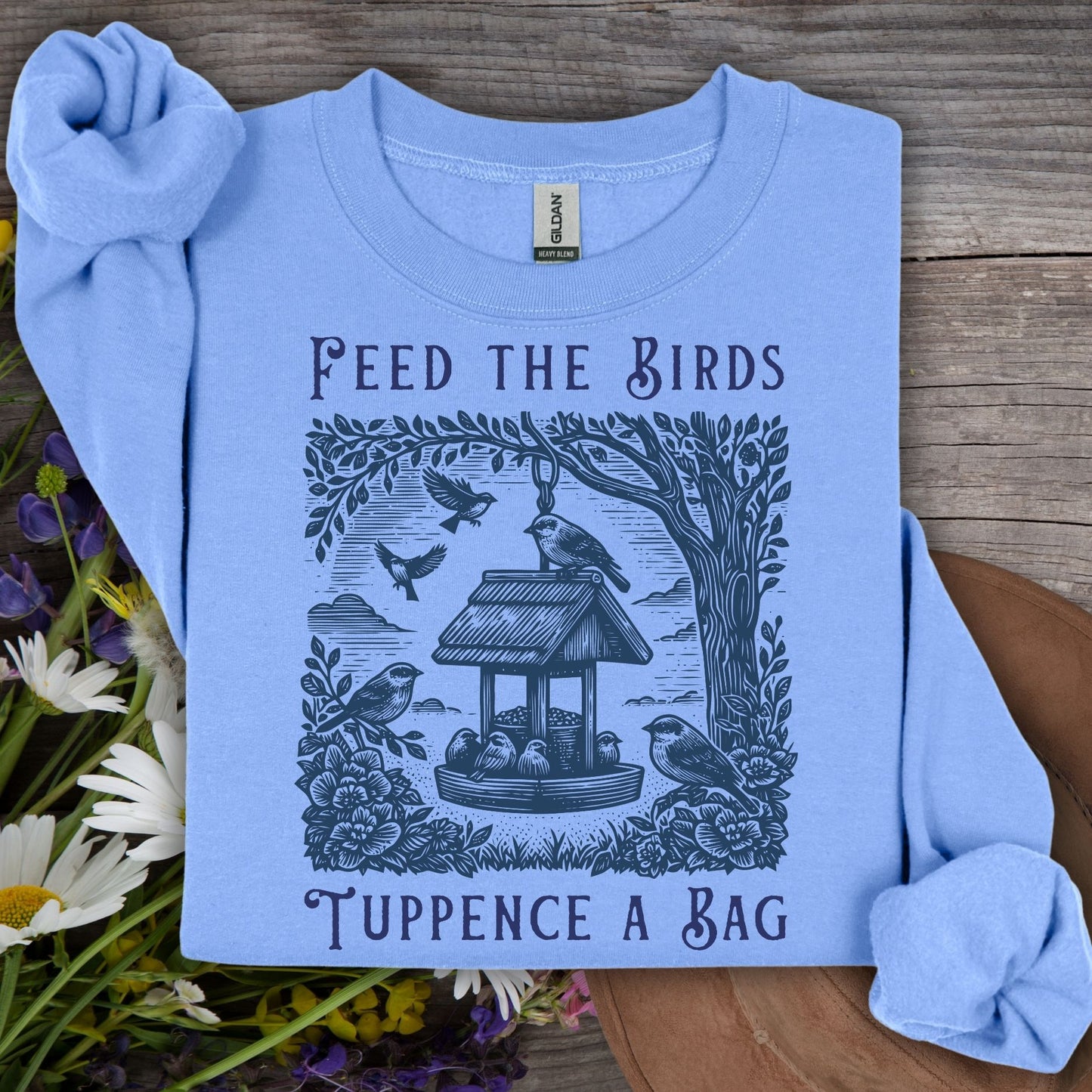 Carolina Blue S sweatshirt with "Feed the Birds, Tuppence a Bag" vintage bird feeder illustration.