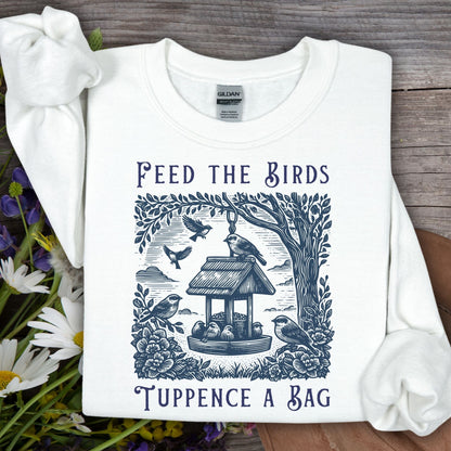 White vintage crewneck sweatshirt with "Feed the Birds, Tuppence a Bag" text and bird feeder illustration.