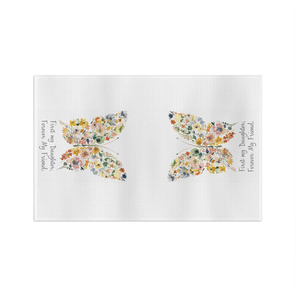 White microfiber tea towel with two watercolor floral butterflies and "First my Daughter, Forever my Friend" text.