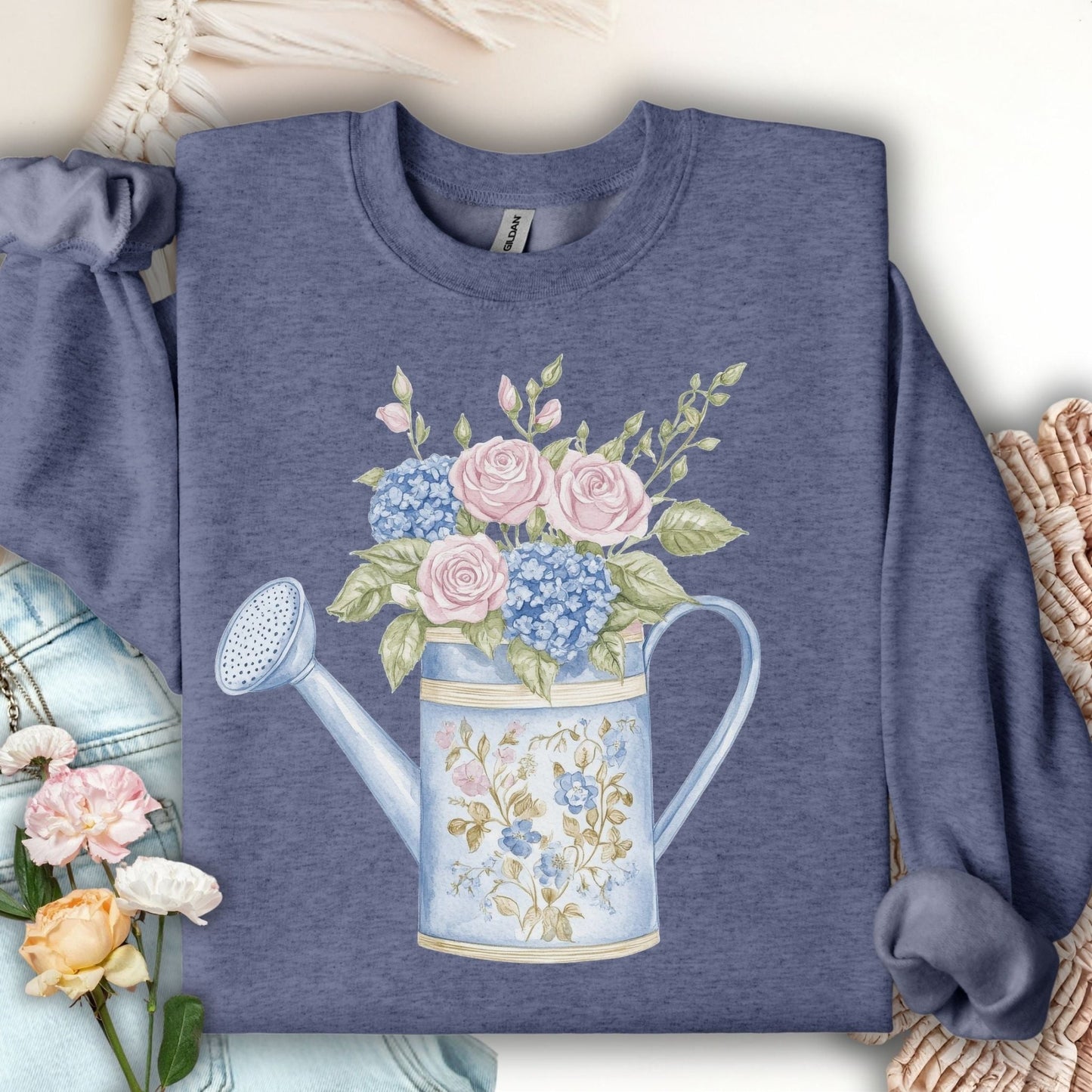 Heather Sport Dark Navy sweatshirt with a watercolor floral watering can design.
