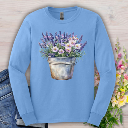 Carolina Blue long sleeve tee with a vintage-feel cotton, featuring a hand-painted lavender and daisy bouquet in a metal pail.