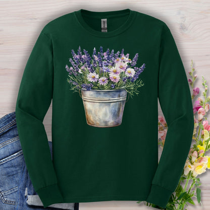 Forest green long sleeve tee with a hand-painted lavender and daisy bouquet in a weathered metal pail.