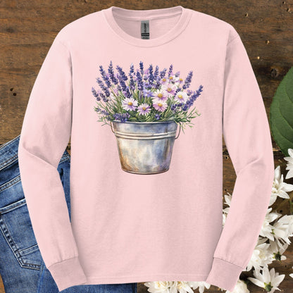 Light pink long sleeve tee with a hand-painted lavender and daisy bouquet in a weathered metal pail.