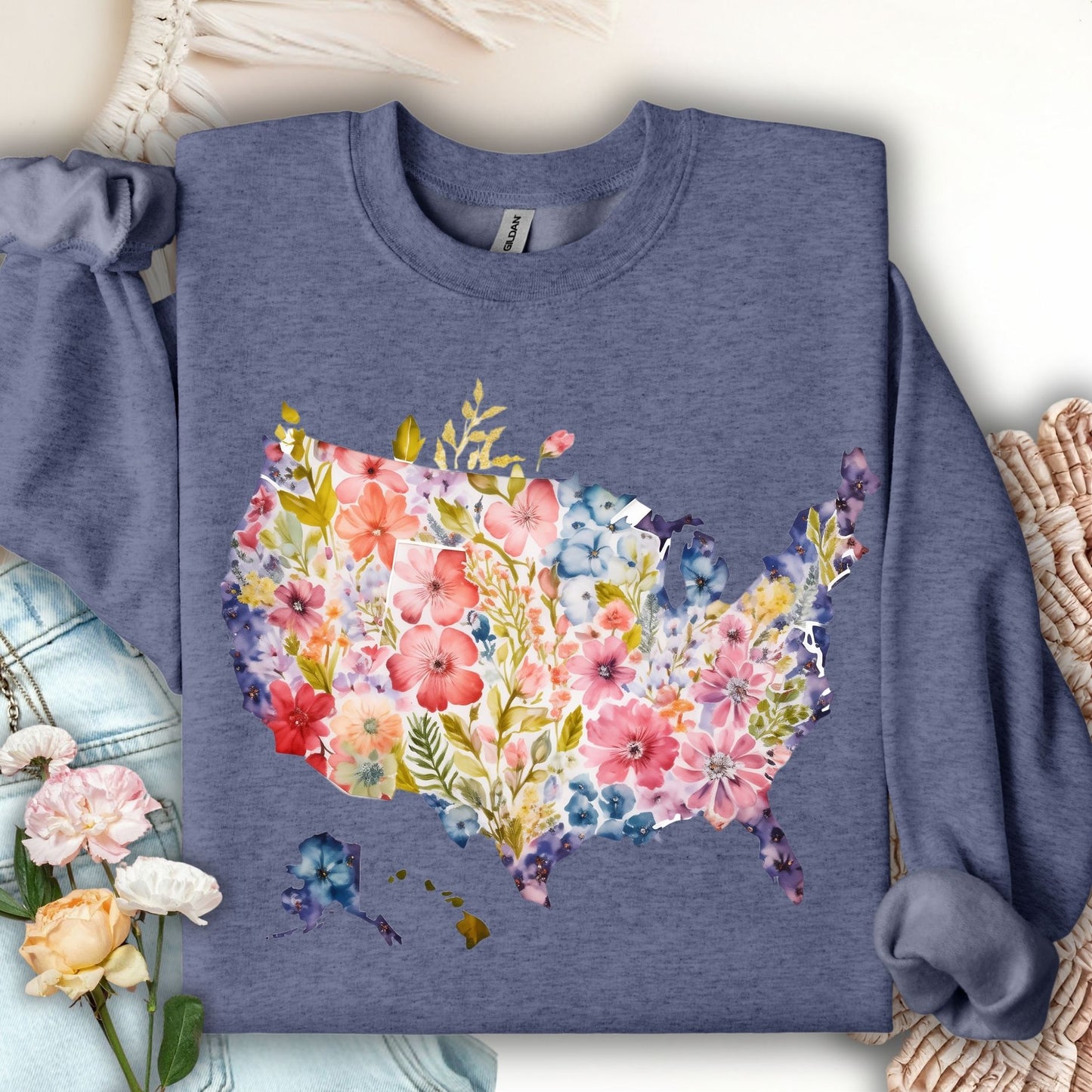 Heather Sport Dark Navy sweatshirt with a watercolor floral map of the USA.