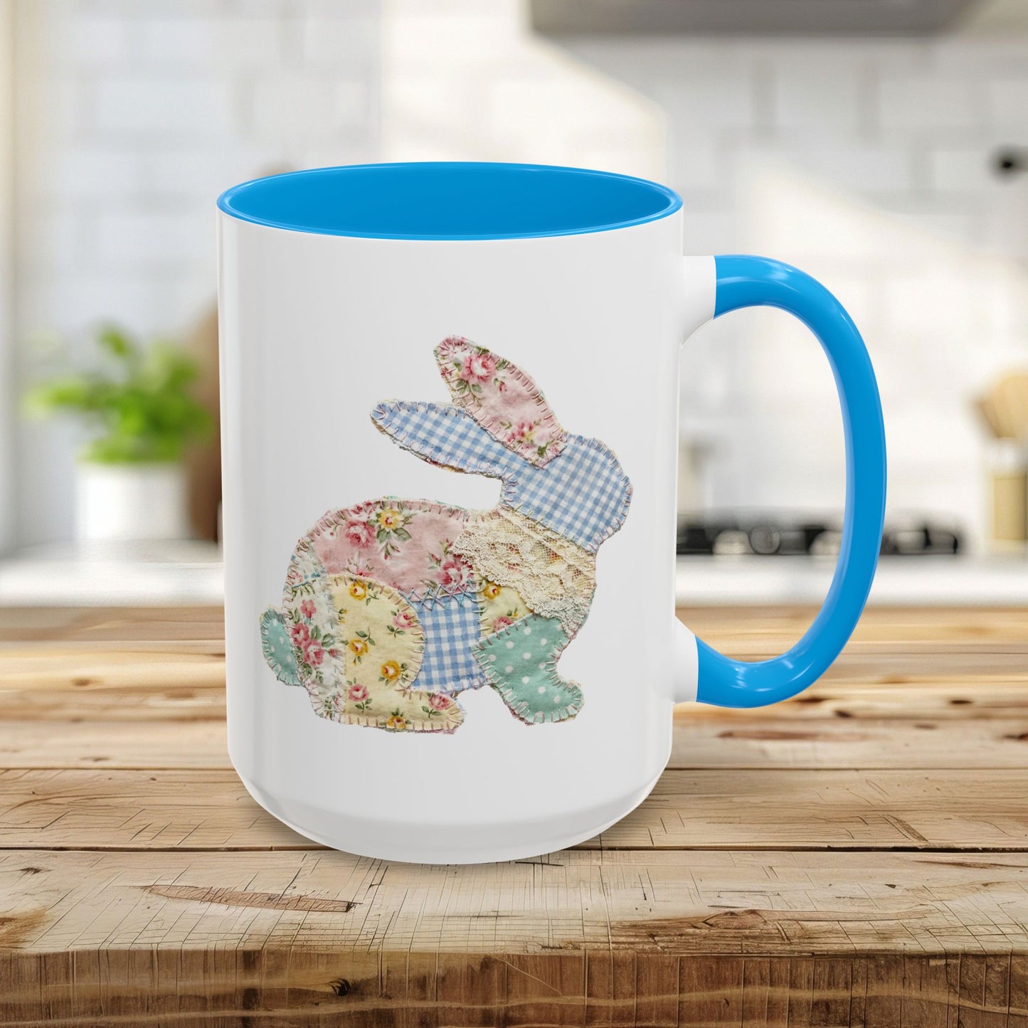 15oz glossy ceramic mug with a light blue interior and handle, featuring a patchwork floral Easter bunny.