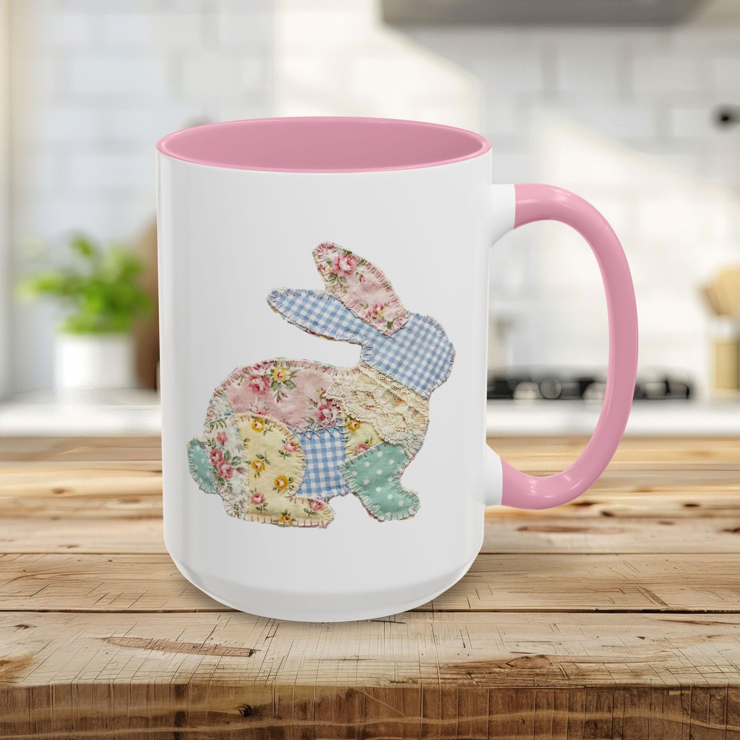 15oz white ceramic mug with pink handle and interior, featuring a patchwork floral Easter bunny design.