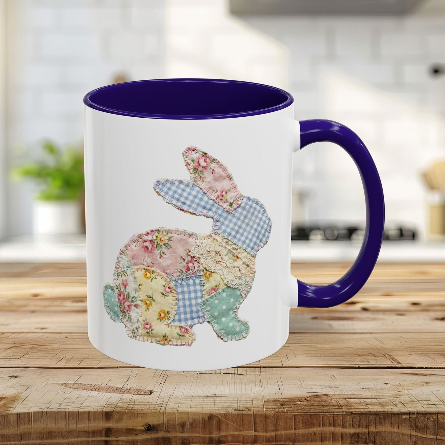 White ceramic mug with a purple handle and interior, featuring a patchwork floral Easter bunny design.