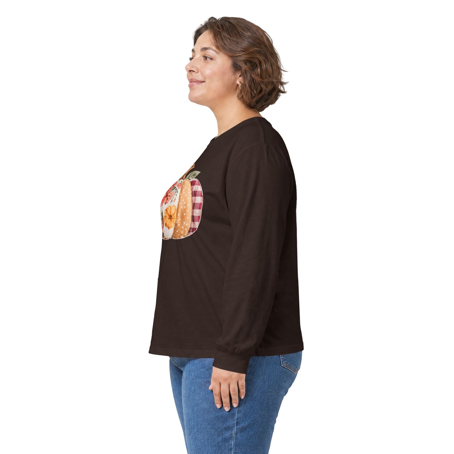 Woman in a brown long sleeve tee with a floral & plaid faux patchwork pumpkin print.
