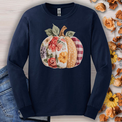 Navy long sleeve tee with a faux patchwork pumpkin featuring floral, plaid, and dotted patterns.