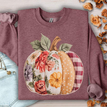 Heather Sport Dark Maroon sweatshirt with a faux patchwork pumpkin design in floral, plaid, and polka dot fabrics.