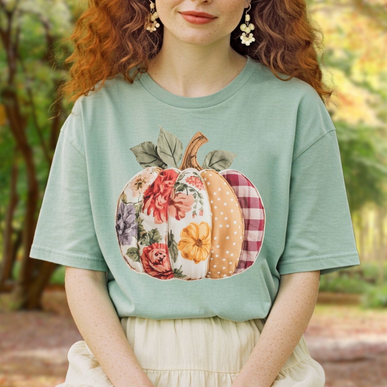 Comfort Colors tee with a faux patchwork pumpkin in floral, gingham, and dotted patterns.