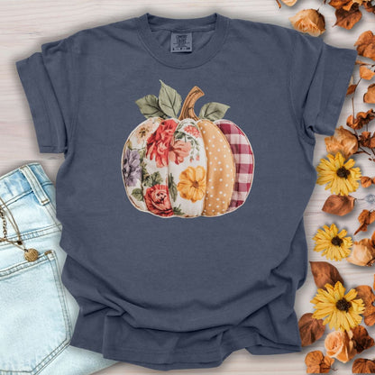 Denim Comfort Colors tee with a faux patchwork pumpkin featuring floral, plaid, and dotted patterns.
