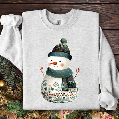 Ash gray Gildan crewneck sweatshirt with a folk art snowman in a teal hat and scarf.