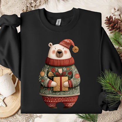 Black Gildan crewneck sweatshirt with a folk art polar bear in a fair isle sweater, holding a gift.