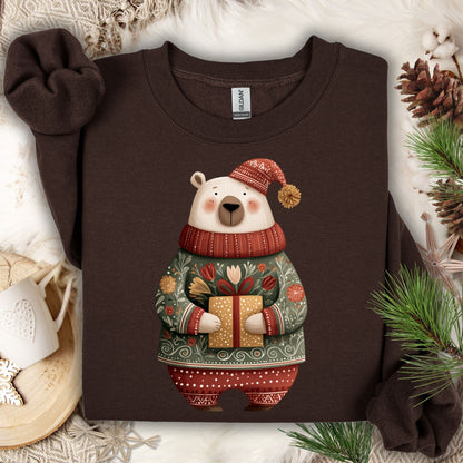 Dark Chocolate Gildan sweatshirt with a folk art polar bear in a fair isle sweater, holding a gift.