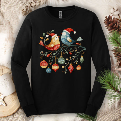 Black long sleeve tee with folk art sparrow and bluebird in Santa hats on a branch with Christmas ornaments.