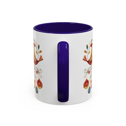 White ceramic mug with purple interior and handle, featuring folk art Christmas birds and ornaments.