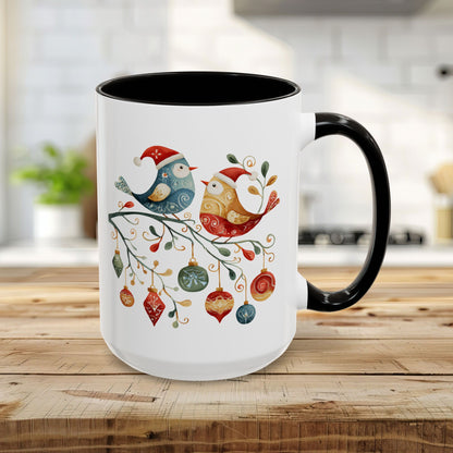 15oz ceramic mug with folk art Christmas birds, ornaments, black interior and handle.