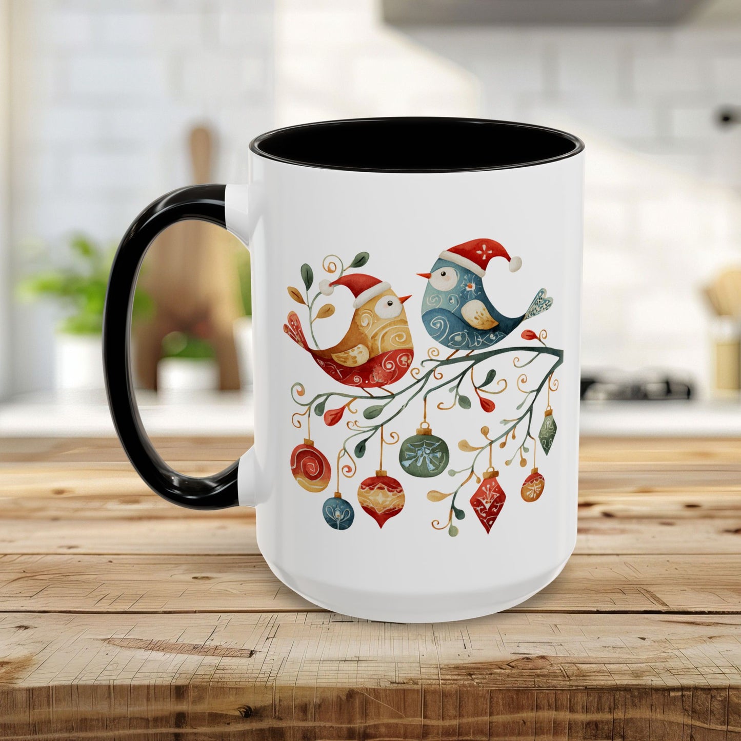 White ceramic mug with black handle and interior, featuring folk art Christmas birds and ornaments.