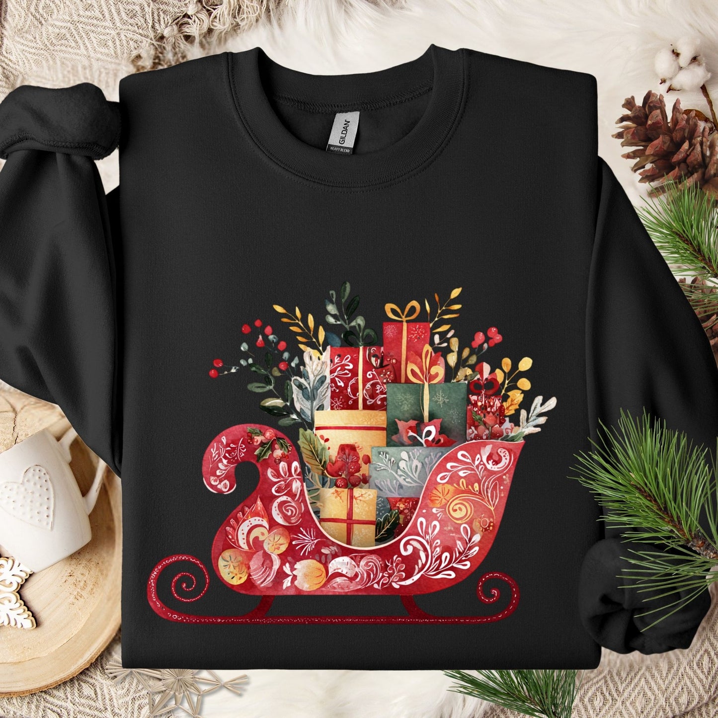 Black Gildan 18000 crewneck sweatshirt with folk art Christmas sleigh brimming with gifts.