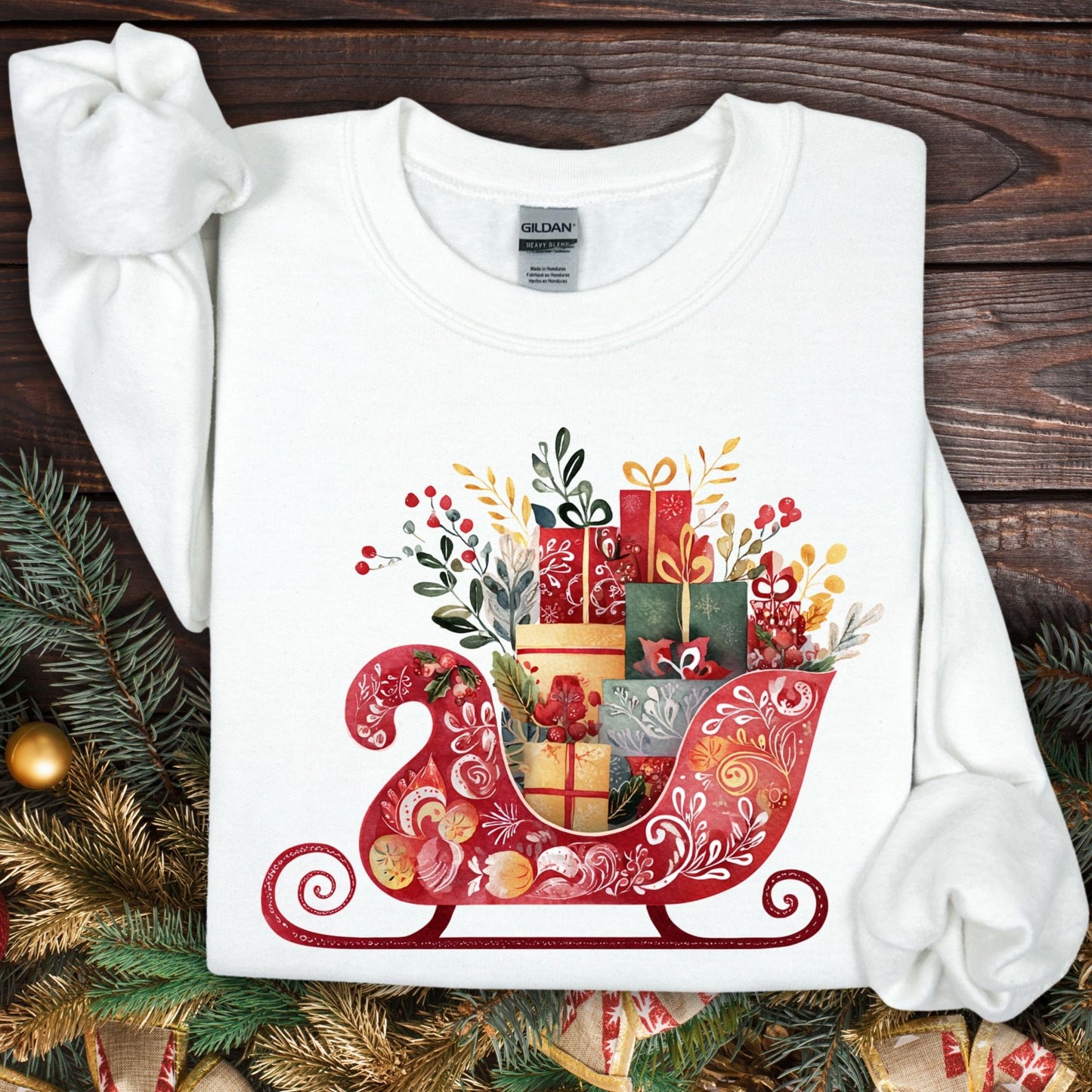 White Gildan 18000 crewneck sweatshirt with folk art Santa's sleigh brimming with colorful gifts.