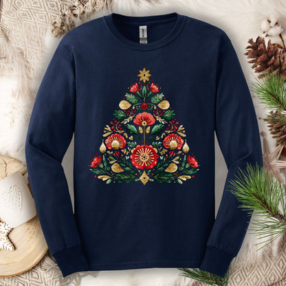 Navy long sleeve tee with a folk art Christmas tree design in red, green, and gold.
