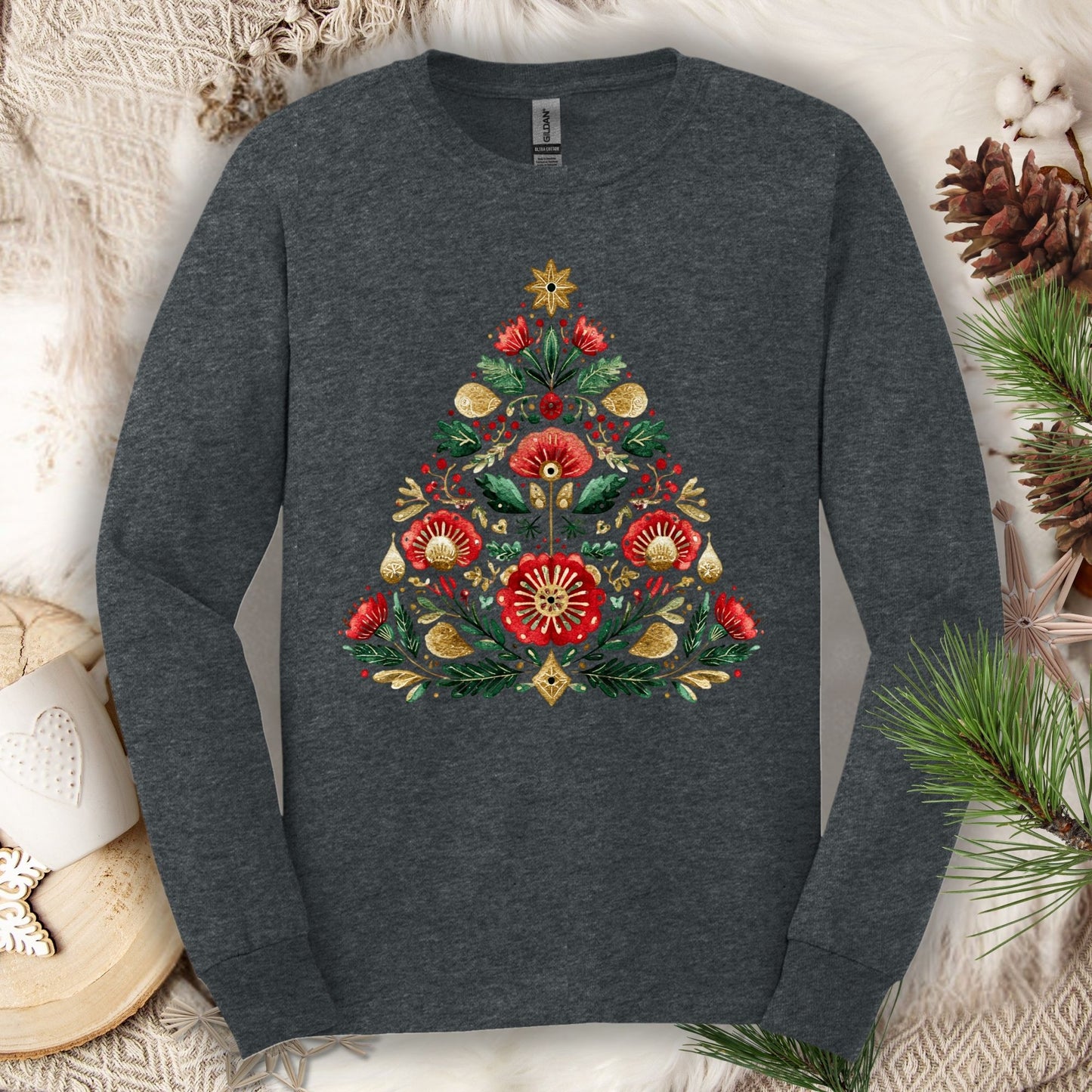 Dark Heather long sleeve tee with a folk art Christmas tree design in red, green, and gold.
