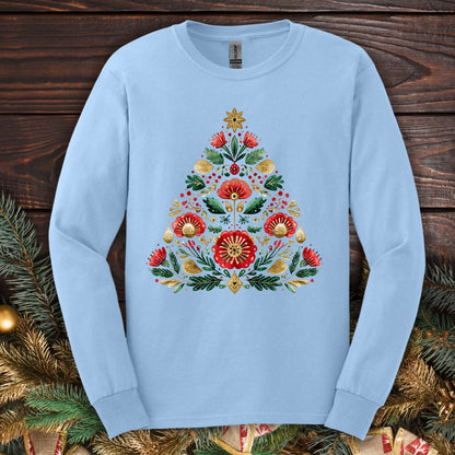 Light blue Gildan long sleeve tee with a folk art Christmas tree design in red, green, and gold.