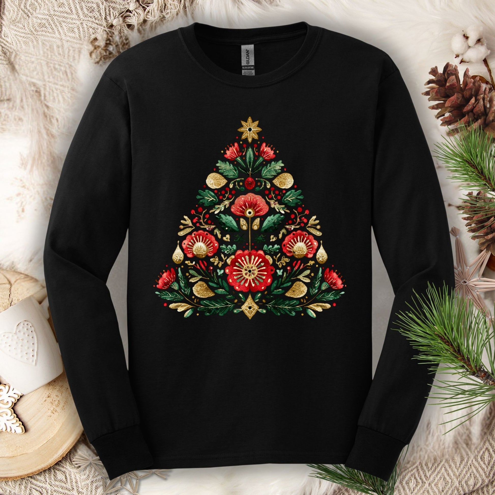 Black Gildan long sleeve tee with a folk art Christmas tree design in red, green, and gold.
