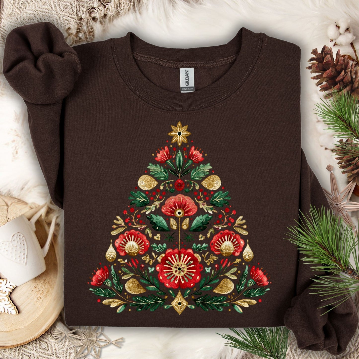 Dark Chocolate Gildan sweatshirt with a folk art Christmas tree design in red, green, and gold.