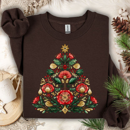 Dark Chocolate Gildan sweatshirt with a folk art Christmas tree design in red, green, and gold.