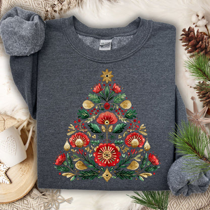 Dark Heather Gildan sweatshirt with a folk art Christmas tree design in red, green, and gold.
