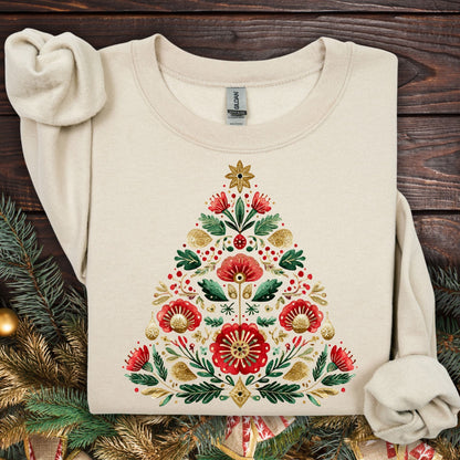 Sand Gildan sweatshirt with a folk art Christmas tree in red, green, and gold.