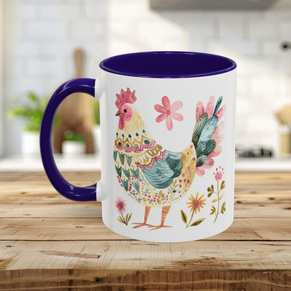 White ceramic mug with a colorful watercolor folk art rooster, purple interior, and C-shaped handle.