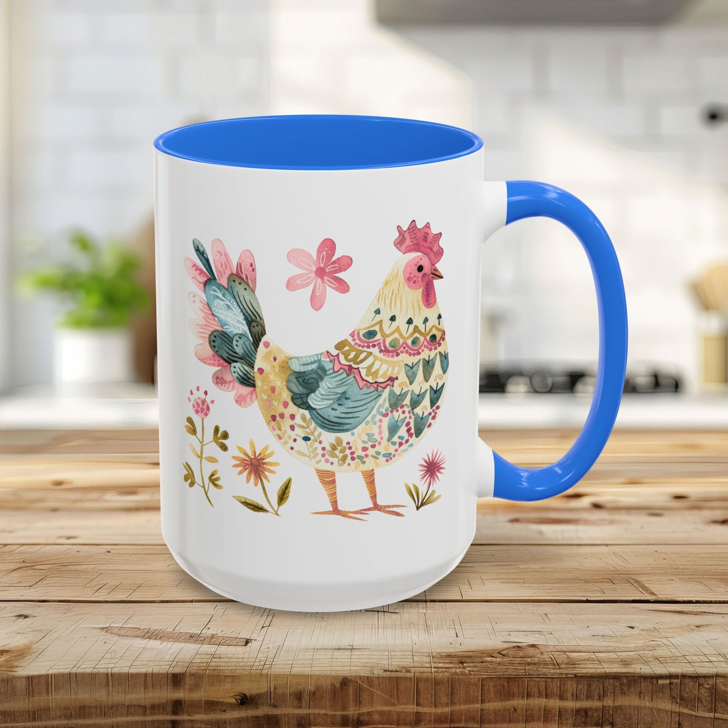 15oz ceramic mug with a vibrant watercolor rooster, floral accents, and a Cambridge blue interior and handle.