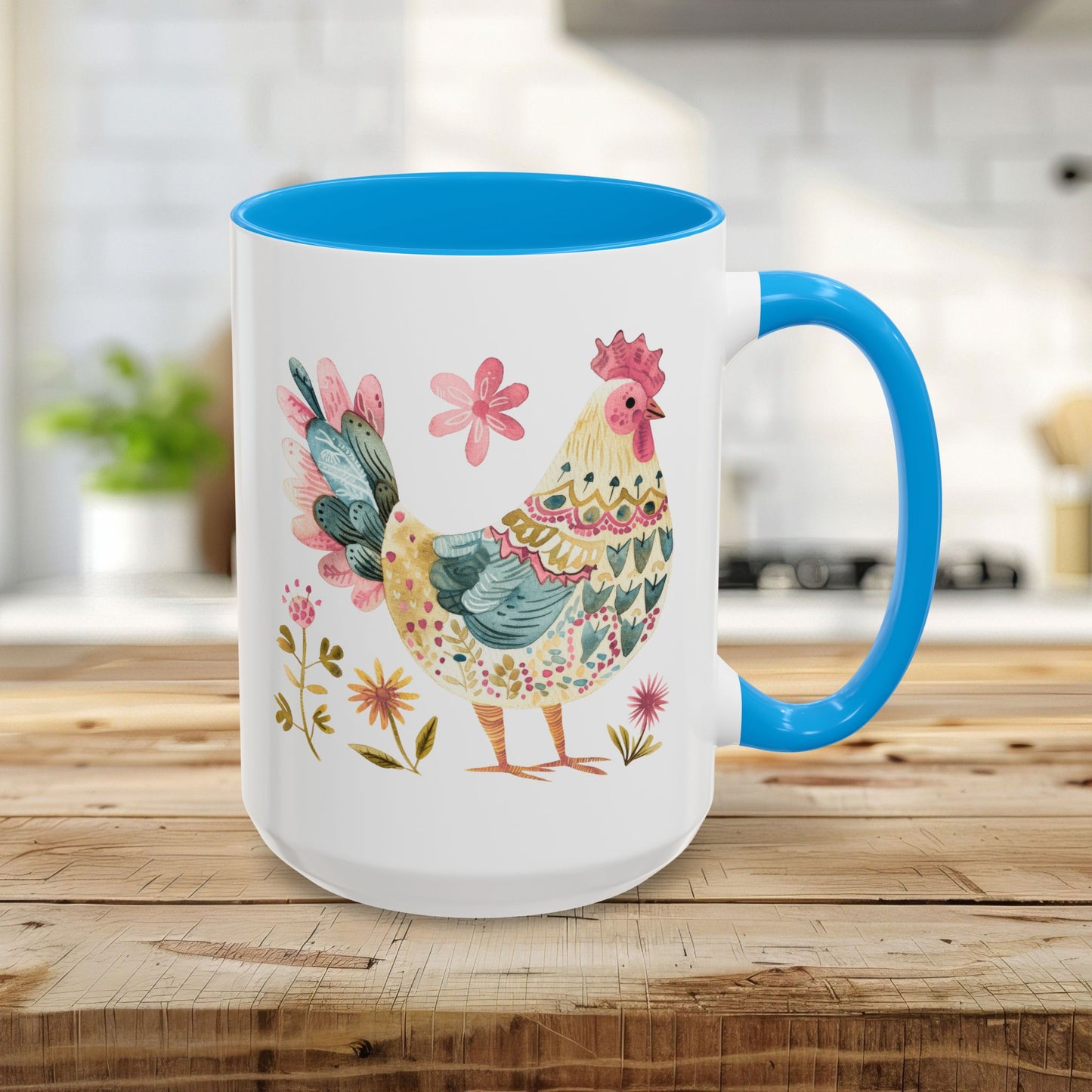 15oz ceramic mug with a colorful watercolor rooster and floral design, featuring a light blue interior and handle.