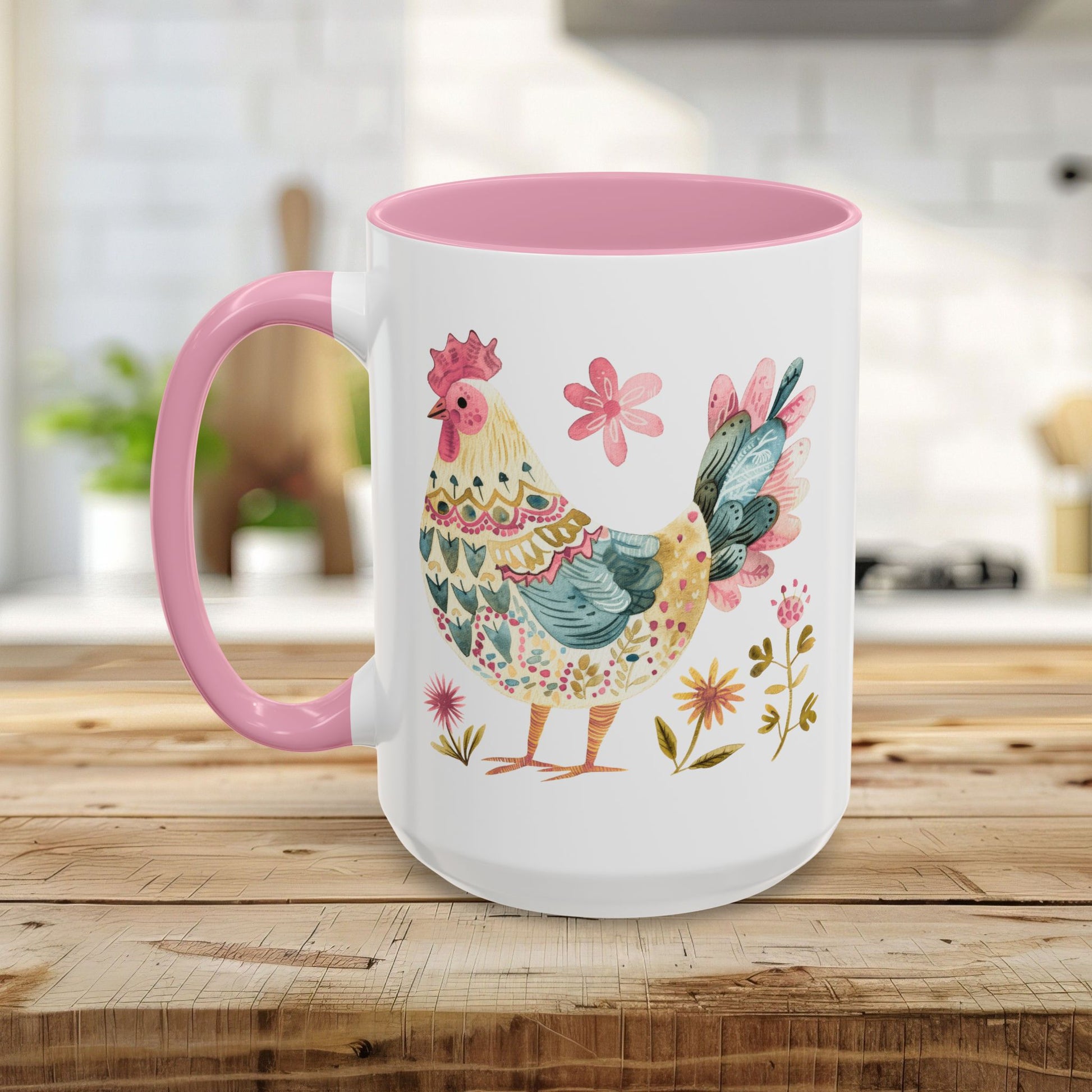 White ceramic mug with a pink handle and interior, featuring a colorful watercolor folk art rooster and floral design.
