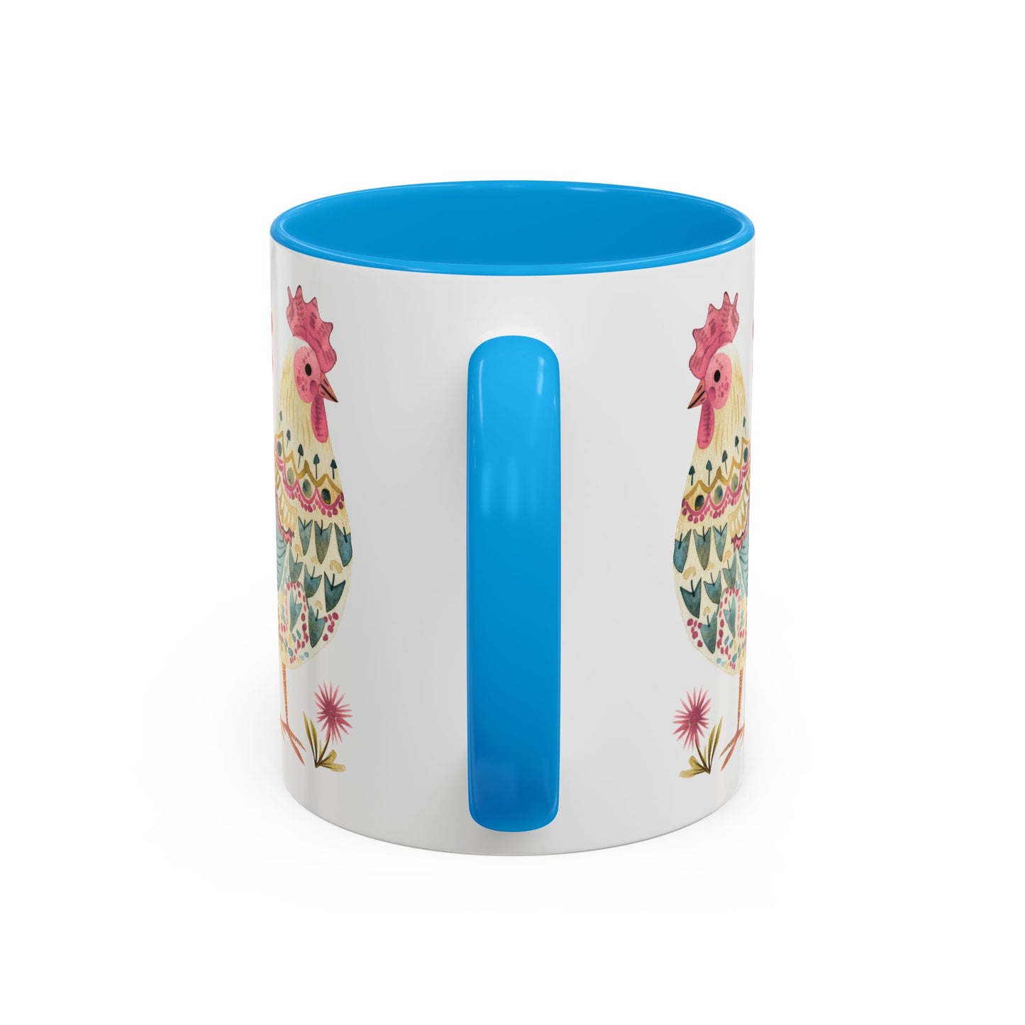 White ceramic mug with blue interior and handle, featuring a colorful folk art watercolor rooster design.