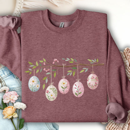 Heather Sport Dark Maroon sweatshirt with watercolor folk art Easter eggs on a floral branch.