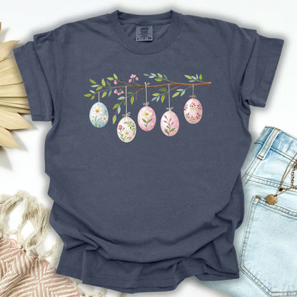 Denim S garment-dyed cotton t-shirt with a watercolor Easter egg branch design.