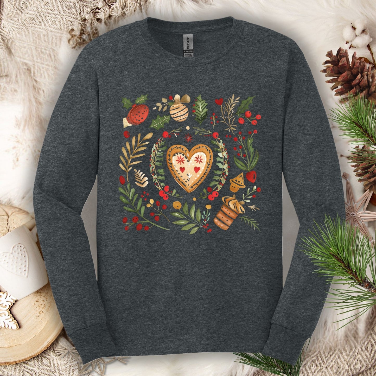 Dark Heather long sleeve tee with folk art gingerbread heart, holly, and vintage baking design.