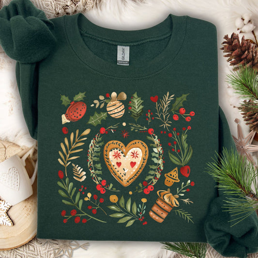 Forest Green S sweatshirt with folk art gingerbread heart, holly, and berries in a festive wreath design.