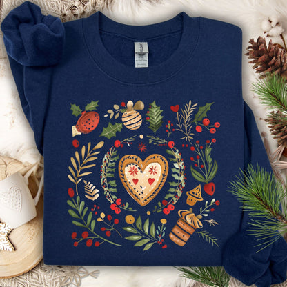 Navy S sweatshirt with folk art gingerbread hearts, red accents, and holly sprigs on soft fleece.