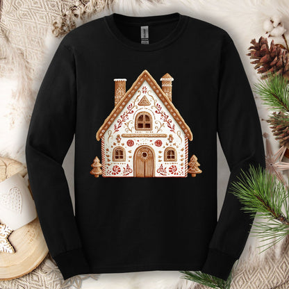 Black Gildan long sleeve tee with a folk art gingerbread house design in watercolor tones.
