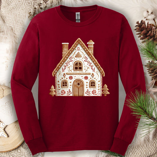 Cardinal Red Gildan long sleeve tee with a folk art gingerbread house design.