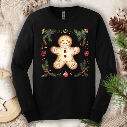 Black long sleeve tee with a hand-painted gingerbread man, pine sprigs, and ornaments.