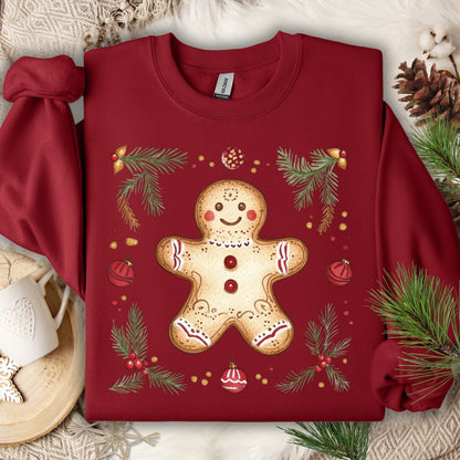 Cardinal Red Gildan sweatshirt with a folk art gingerbread man, holly, and evergreen design.