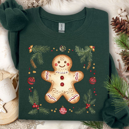 Forest Green Gildan sweatshirt with a folk art gingerbread man, holly, and evergreen design.
